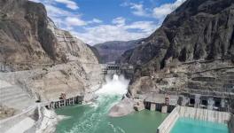 世界首座300米級低熱水泥混凝土特高拱壩全線貫通！